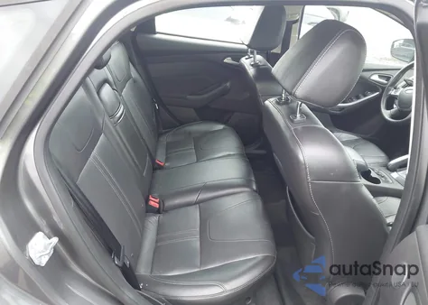 2012 Ford Focus Titanium z USA, uszkodzony, nr VIN 1FAHP3N21CL433734